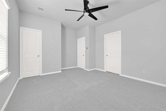 13218 Hp Johnson St A/B, Unit A/B Kendleton, TX 77451 - unfurnished bedroom featuring carpet, baseboards, ceiling fan, and visible vents