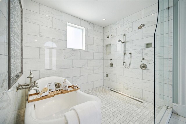 2222 Oxford St, Houston, TX 77008 - full bathroom featuring tile walls, a soaking tub, and tiled shower