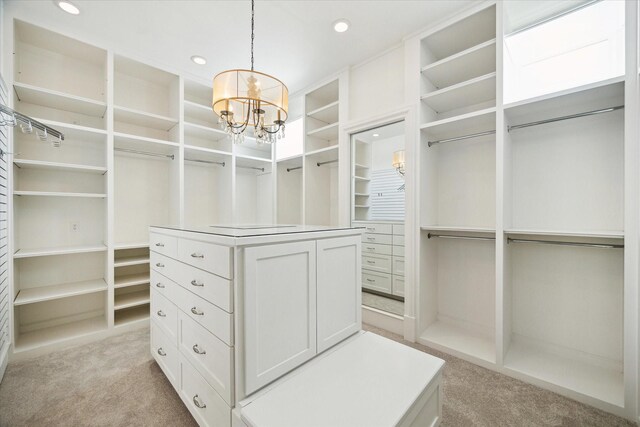 2222 Oxford St, Houston, TX 77008 - walk in closet with a chandelier and light carpet