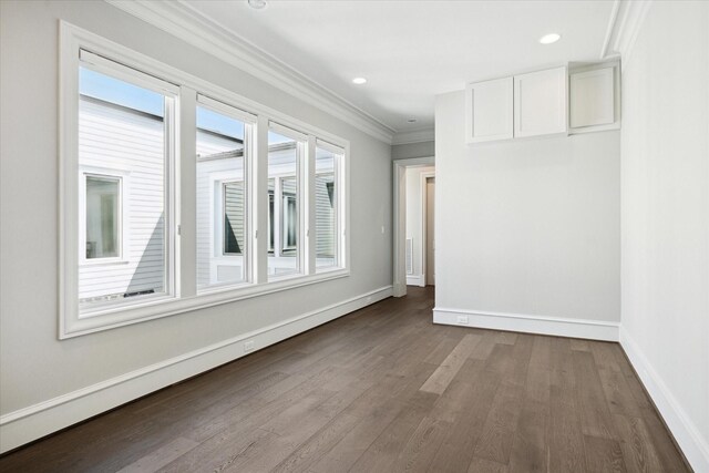 2222 Oxford St, Houston, TX 77008 - unfurnished room with recessed lighting, crown molding, baseboards, and dark wood-type flooring
