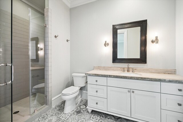 2222 Oxford St, Houston, TX 77008 - full bathroom with tile patterned floors, toilet, vanity, a shower stall, and baseboards