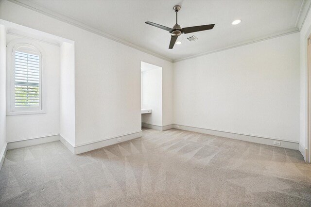 2222 Oxford St, Houston, TX 77008 - carpeted empty room featuring baseboards, a ceiling fan, visible vents, and crown molding