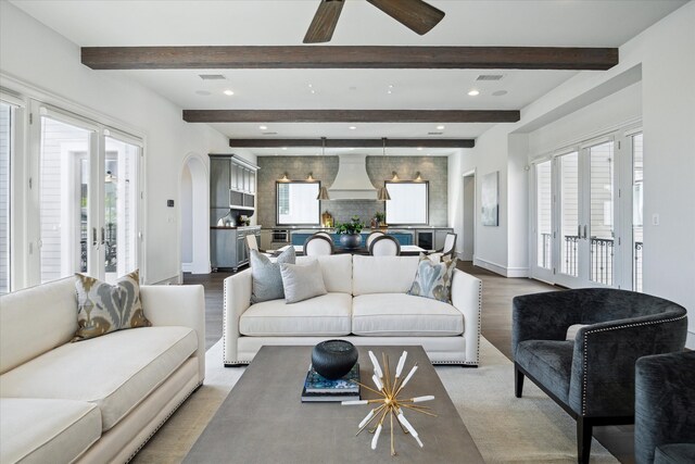 2222 Oxford St, Houston, TX 77008 - living room with baseboards, visible vents, and a healthy amount of sunlight