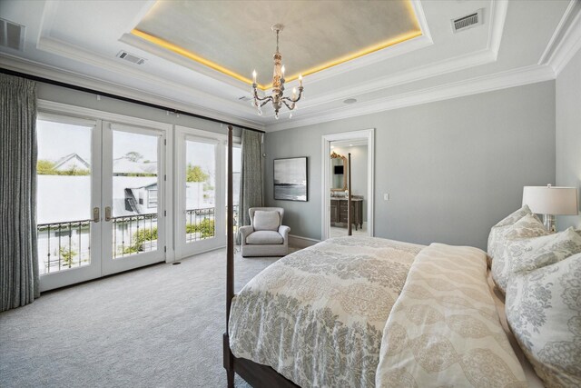 2222 Oxford St, Houston, TX 77008 - carpeted bedroom with visible vents, french doors, and a raised ceiling