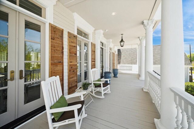 2222 Oxford St, Houston, TX 77008 - wooden terrace featuring french doors and covered porch