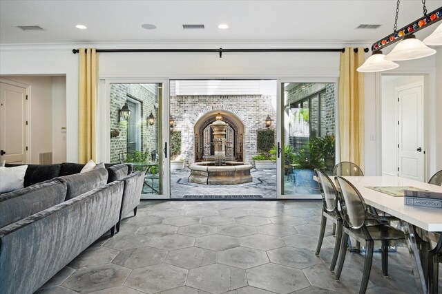 2222 Oxford St, Houston, TX 77008 - living area with recessed lighting, ornamental molding, and visible vents