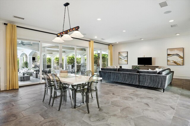 2222 Oxford St, Houston, TX 77008 - dining space featuring recessed lighting, crown molding, and visible vents