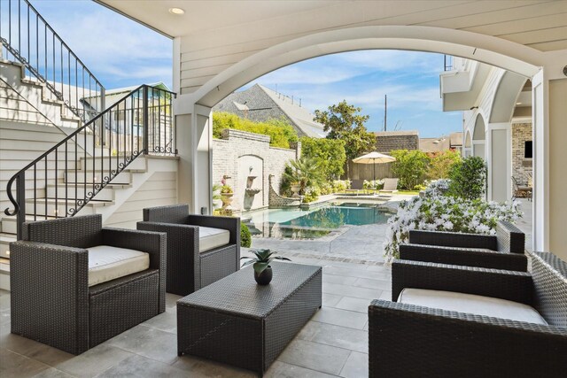 2222 Oxford St, Houston, TX 77008 - view of patio with outdoor lounge area, a fenced backyard, stairway, and an outdoor pool