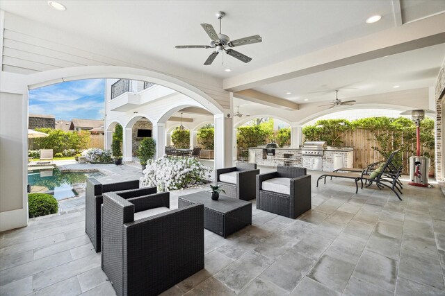 2222 Oxford St, Houston, TX 77008 - view of patio with fence, outdoor lounge area, exterior kitchen, grilling area, and ceiling fan