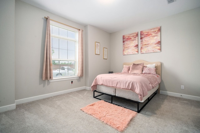 10215 Napier Dr, Rosharon, TX 77583 - carpeted bedroom featuring baseboards