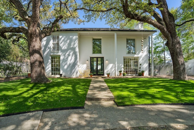 2207 Stanmore Dr, Houston, TX 77019 - view of front facade with french doors and stucco siding
