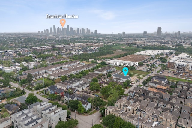 birds eye view of property with a view of city