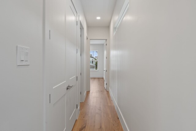 710 Waverly St Unit D, Houston, TX 77007 - hall featuring light wood-type flooring, recessed lighting, and baseboards