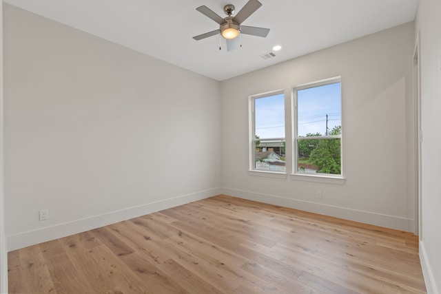 unfurnished room featuring visible vents, baseboards, recessed lighting, and light wood-style floors