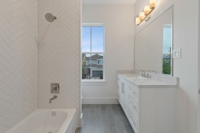 full bath featuring baseboards, shower / bath combination, and vanity