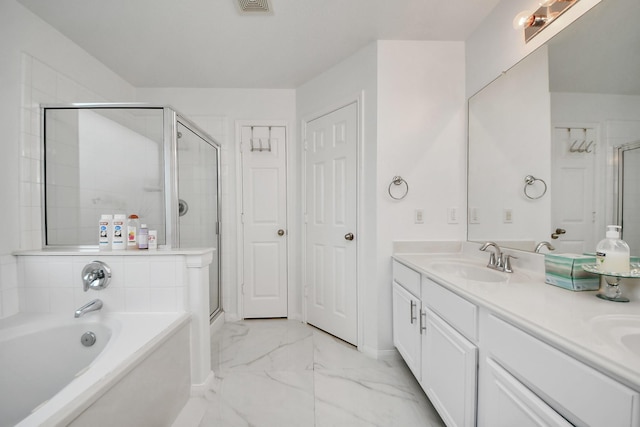 bathroom featuring a shower stall, marble finish floor, a sink, double vanity, and a bath