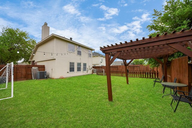 back of property featuring cooling unit, a fenced backyard, a pergola, a yard, and a chimney