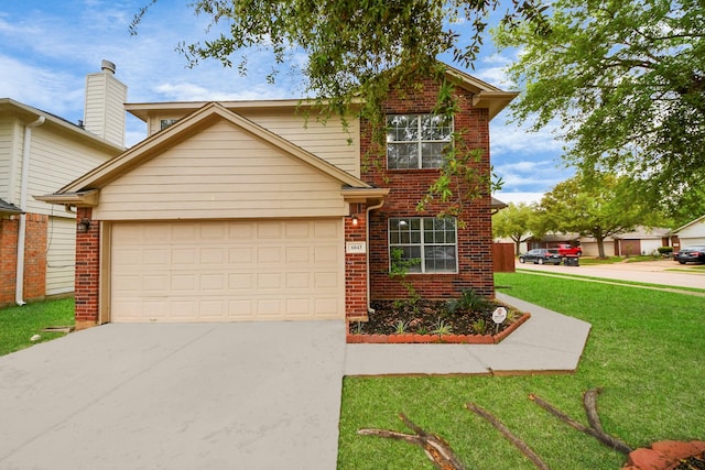 traditional-style home featuring driveway, a front yard, and brick siding