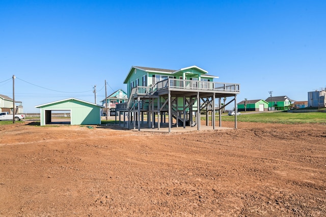 view of outbuilding featuring an outbuilding and stairway