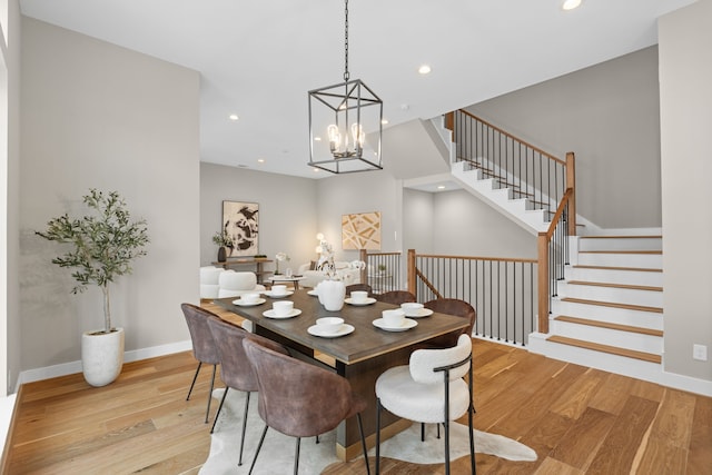 1177 W 19th St, Houston, TX 77008 - dining space with stairway, light wood finished floors, baseboards, and recessed lighting