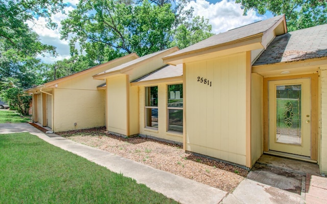 12728 Hollandale Dr, Houston, TX 77082 - doorway to property featuring a yard