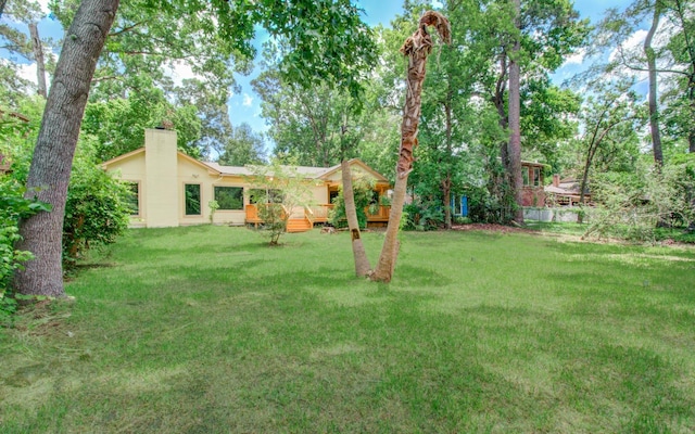 12728 Hollandale Dr, Houston, TX 77082 - view of grassy yard featuring a wooden deck