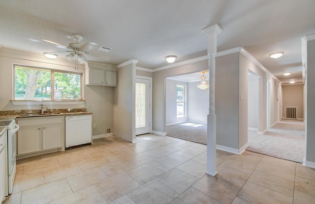 12728 Hollandale Dr, Houston, TX 77082 - kitchen featuring white appliances, ornamental molding, ceiling fan, dark stone counters, and light colored carpet