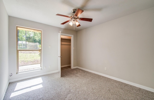 12728 Hollandale Dr, Houston, TX 77082 - unfurnished bedroom with carpet flooring and a ceiling fan