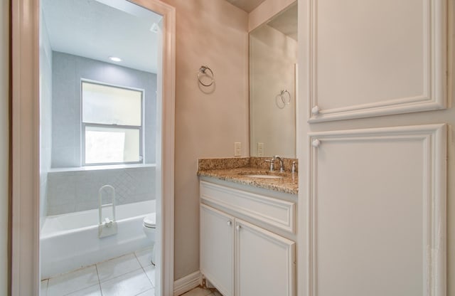 12728 Hollandale Dr, Houston, TX 77082 - bathroom with vanity, a tub to relax in, and tile patterned flooring