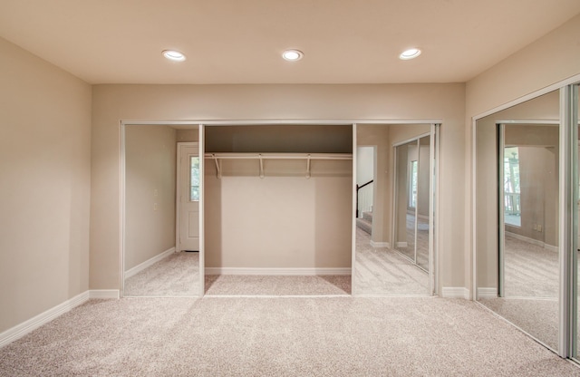 12728 Hollandale Dr, Houston, TX 77082 - unfurnished bedroom with carpet, recessed lighting, and multiple windows