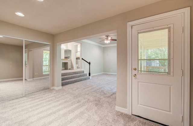 12728 Hollandale Dr, Houston, TX 77082 - foyer featuring carpet, stairway, plenty of natural light, a ceiling fan, and recessed lighting