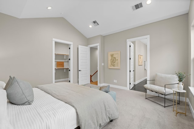 1193 W 19th St, Houston, TX 77008 - carpeted bedroom featuring lofted ceiling, baseboards, a spacious closet, and recessed lighting