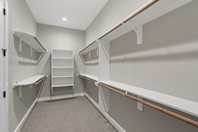1193 W 19th St, Houston, TX 77008 - walk in closet featuring light colored carpet