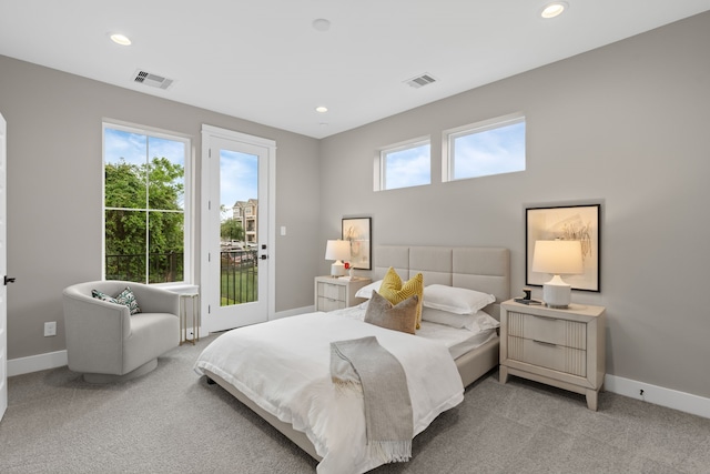 1193 W 19th St, Houston, TX 77008 - bedroom featuring access to exterior, baseboards, multiple windows, and recessed lighting