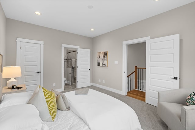 1193 W 19th St, Houston, TX 77008 - carpeted bedroom with recessed lighting, baseboards, and ensuite bath