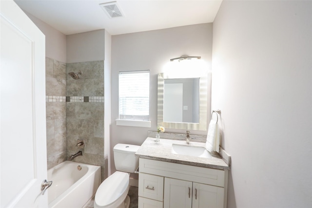 1005 Bingham St Unit 5, Houston, TX 77007 - full bathroom with toilet, visible vents, tub / shower combination, and vanity
