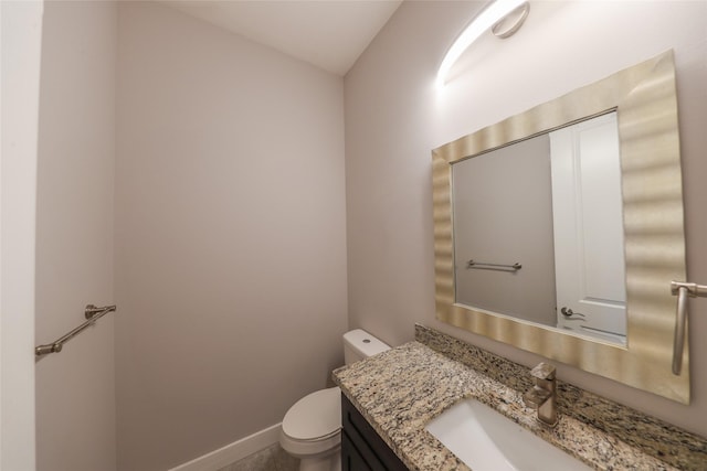 1005 Bingham St Unit 5, Houston, TX 77007 - half bathroom featuring vanity, toilet, and baseboards