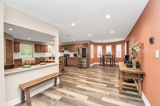 20202 Deer Run Rd, Damon, TX 77430 - living area featuring recessed lighting, baseboards, and wood finished floors