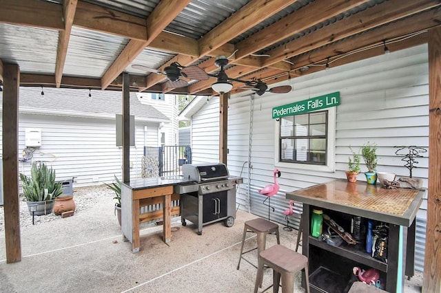 20202 Deer Run Rd, Damon, TX 77430 - view of patio / terrace featuring outdoor dining space, ceiling fan, and area for grilling