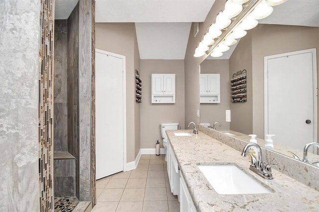 20202 Deer Run Rd, Damon, TX 77430 - bathroom with toilet, tile patterned floors, and a sink