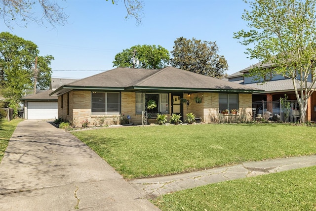 6625 Fairfield St, Houston, TX 77023 - view of front of home with brick siding, a detached garage, and a shingled roof