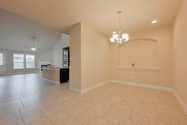 unfurnished room featuring light tile patterned floors, baseboards, vaulted ceiling, and ceiling fan with notable chandelier