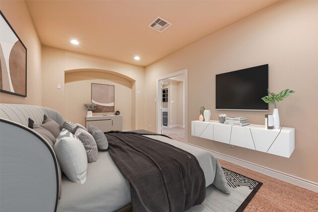 carpeted bedroom featuring visible vents, baseboards, and recessed lighting