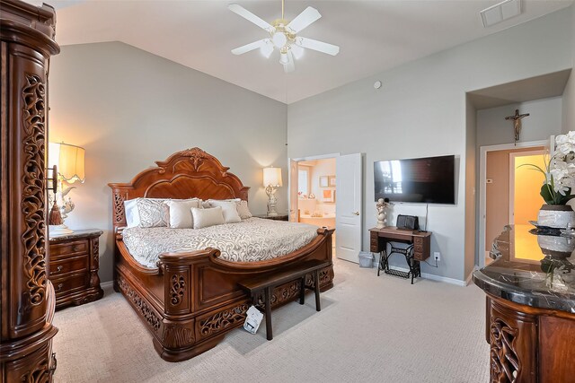 bedroom with baseboards, light carpet, lofted ceiling, and visible vents