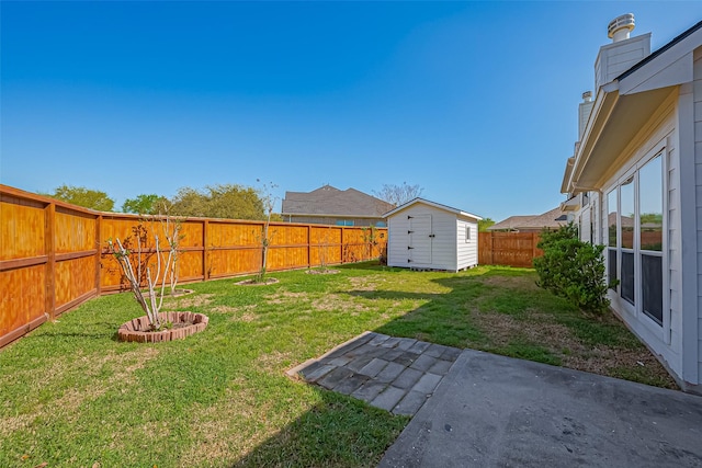 view of yard featuring a patio, a fenced backyard, a shed, and an outdoor structure