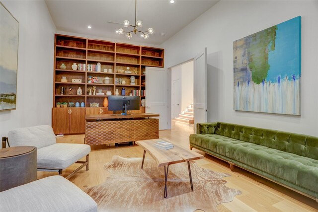 1810 Dunlavy St, Houston, TX 77006 - living room featuring light wood-type flooring, a chandelier, an office area, recessed lighting, and stairway