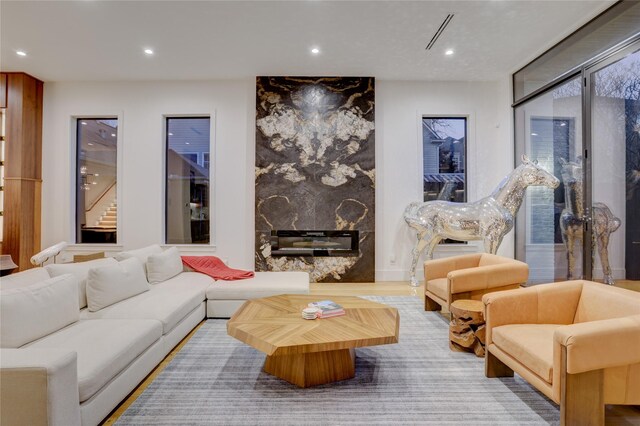 1810 Dunlavy St, Houston, TX 77006 - living room featuring recessed lighting, stairs, and a fireplace