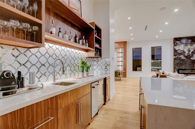 1810 Dunlavy St, Houston, TX 77006 - kitchen with a sink, modern cabinets, light wood-style flooring, recessed lighting, and open shelves
