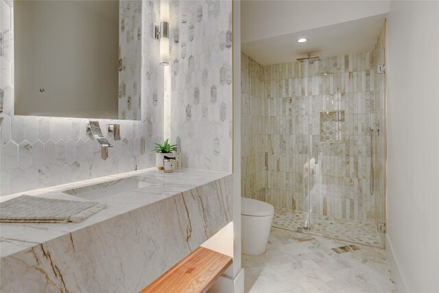 1810 Dunlavy St, Houston, TX 77006 - full bath with toilet, a shower stall, marble finish floors, recessed lighting, and baseboards