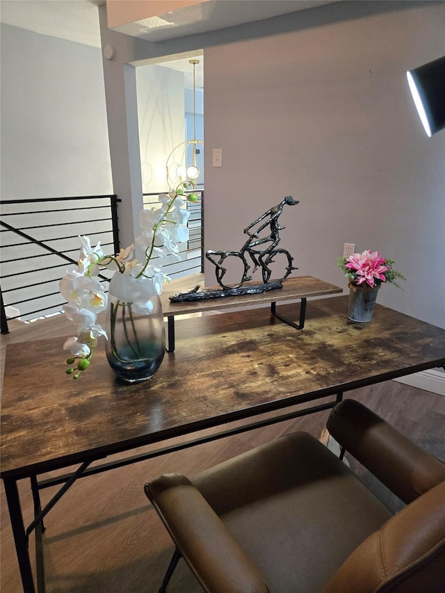 dining space featuring wood finished floors